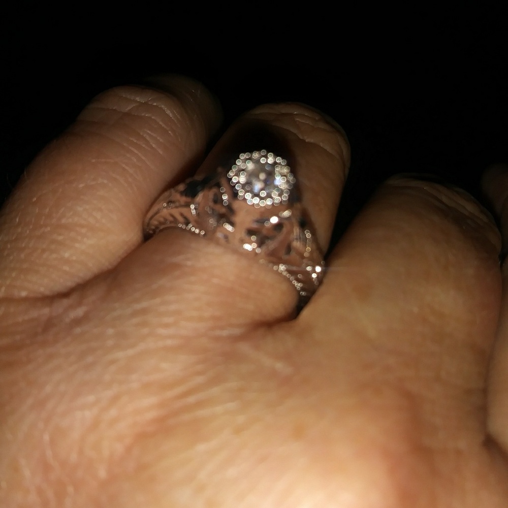 silver .10 carat diamind ring.